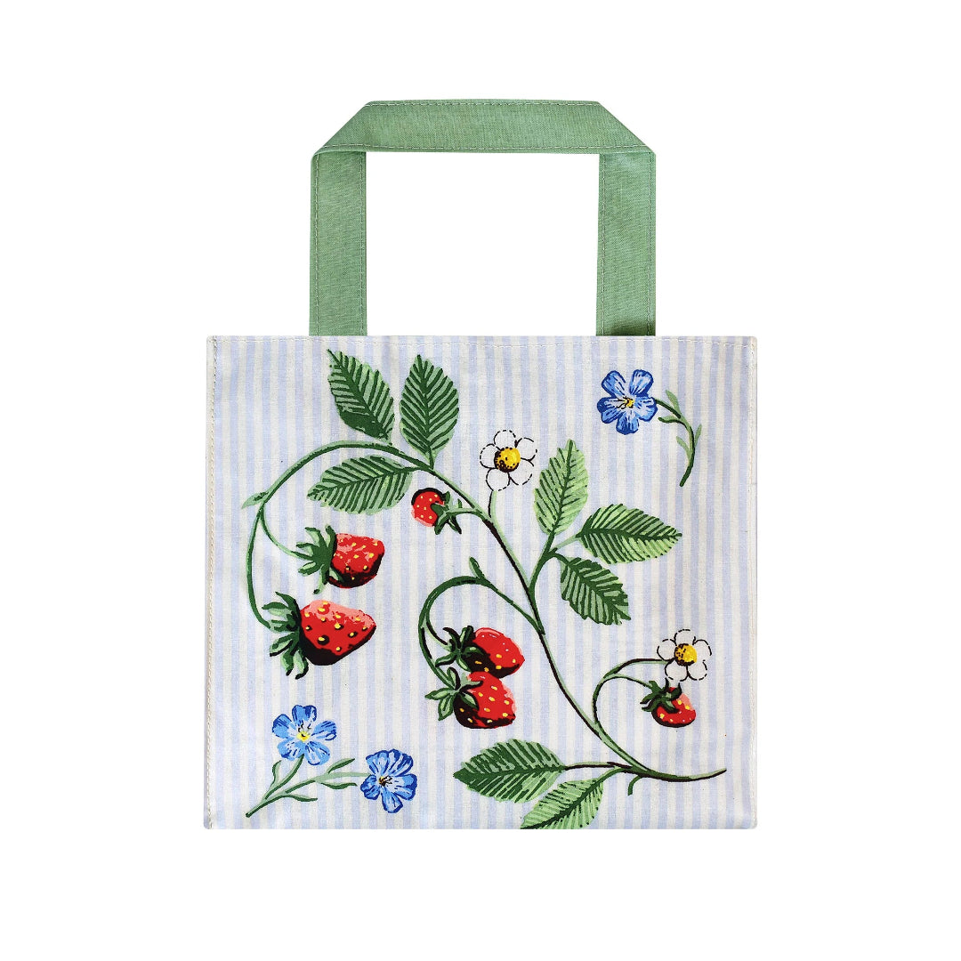 Tote bag with strawberry and floral design on a striped background