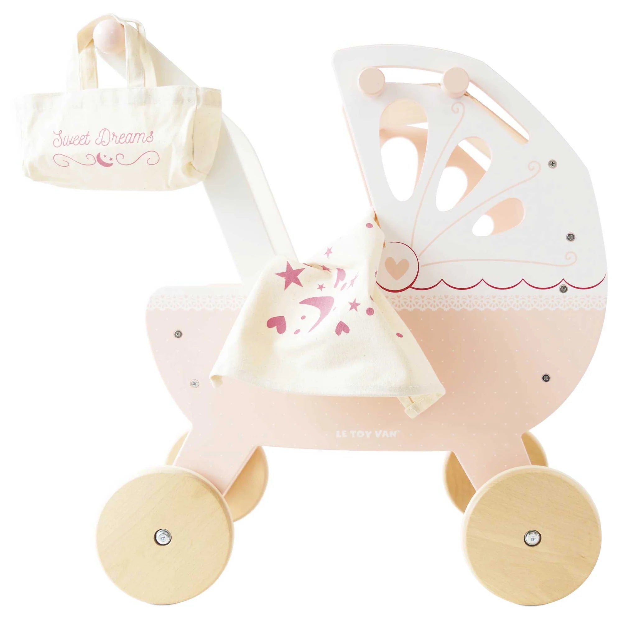 A pastel pink, cream, and white wooden doll pram with a soft padded mattress, retractable hand-sewn canopy, and a removable changing bag, equipped with solid natural wheels and rubber grips.