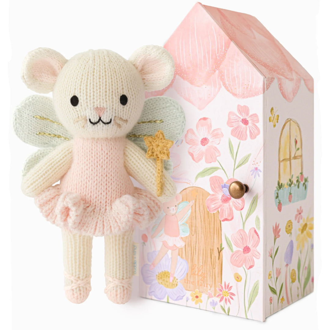 Knitted fairy mouse toy with a decorative box featuring floral and fairy designs.
