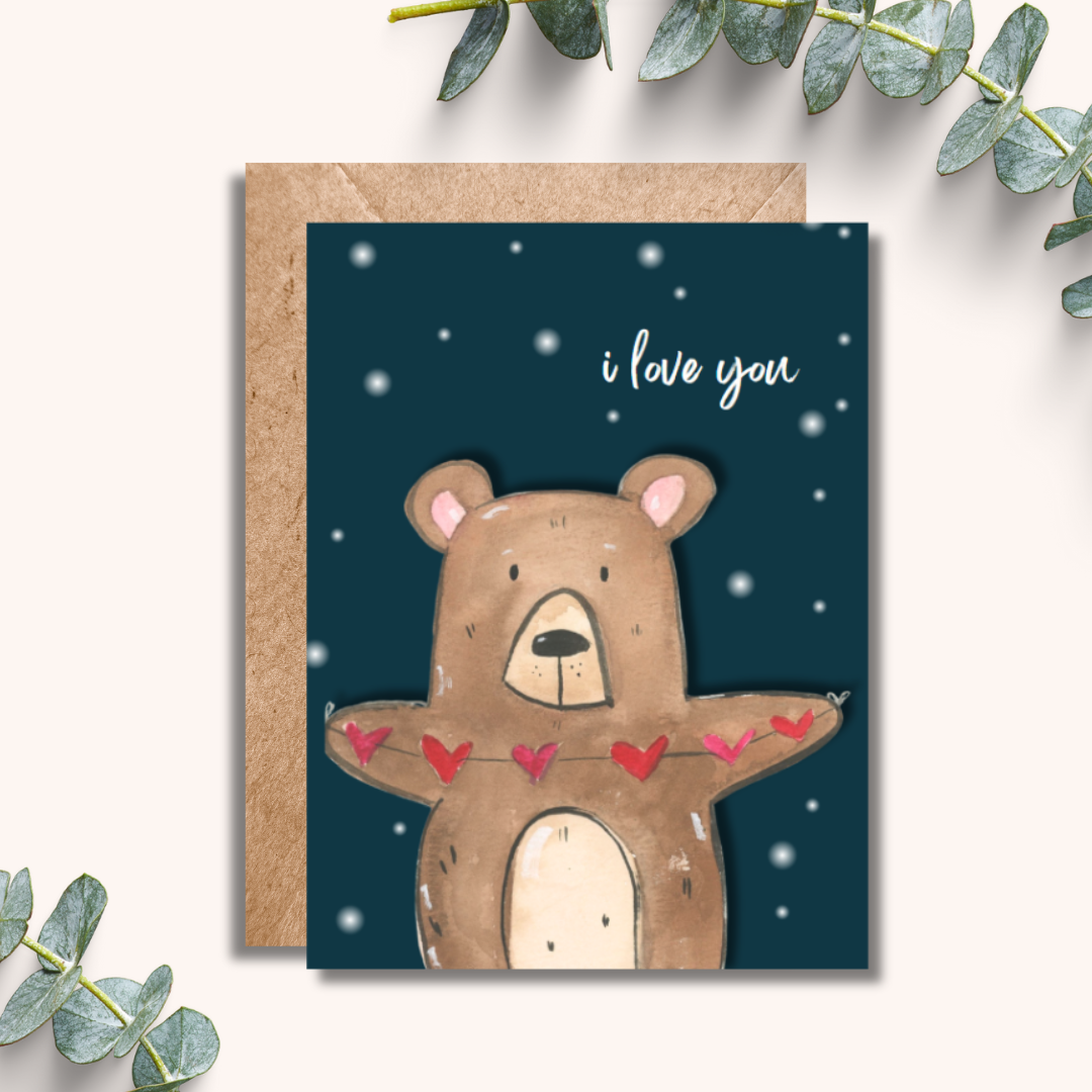 Greeting card with a bear illustration and 'I love you' text on a dark blue background.