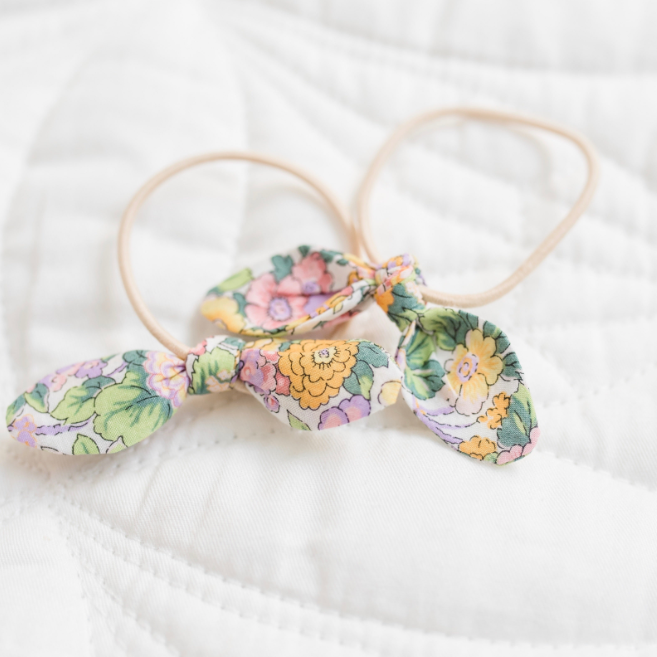 Floral hair elastics on a white background
