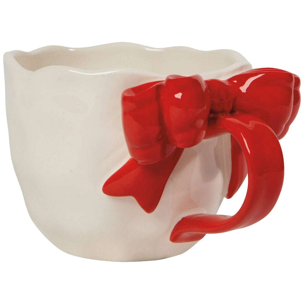 White mug with a red bow and handle on a white background