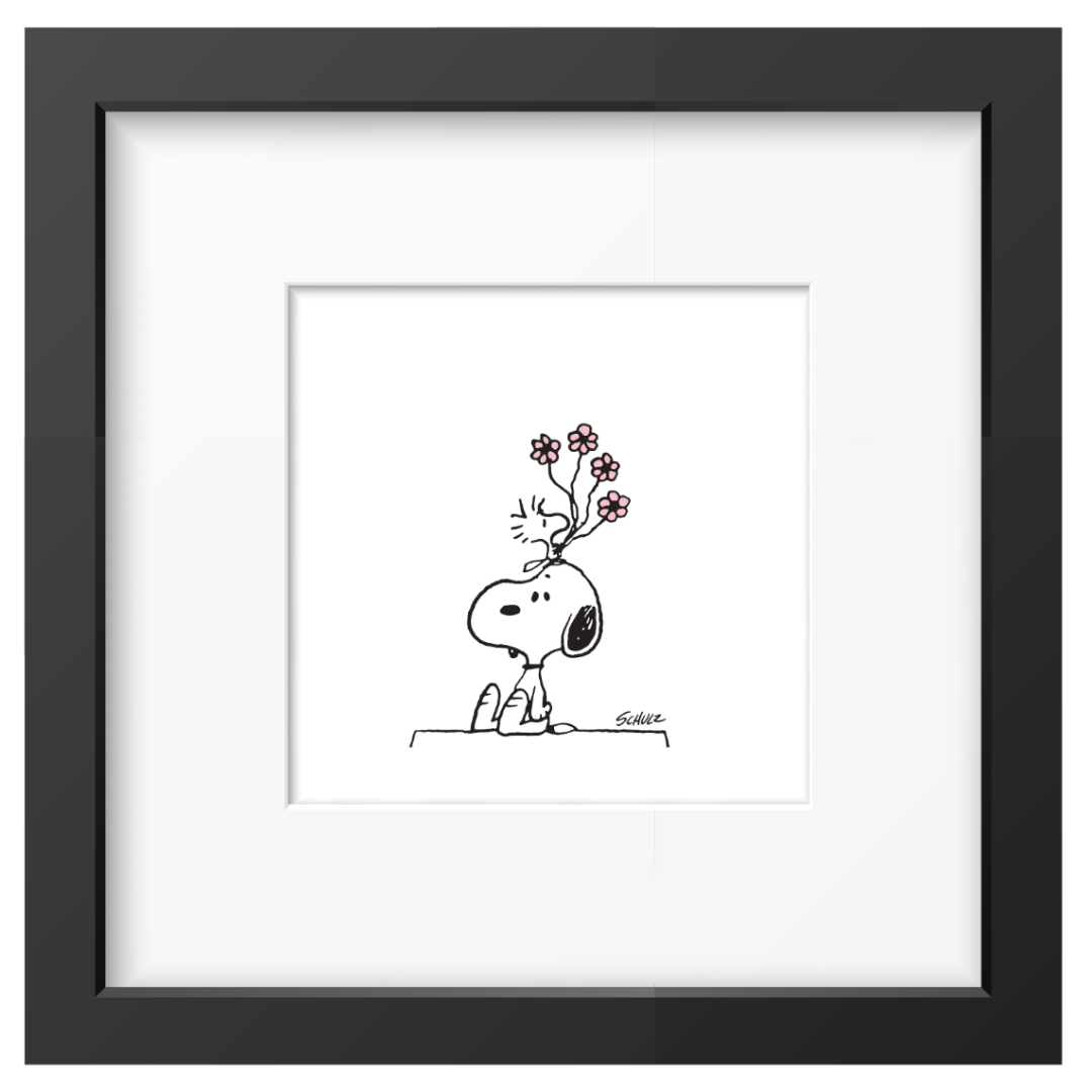 Framed black and white illustration of Snoopy and Woodstock holding flowers on his head.