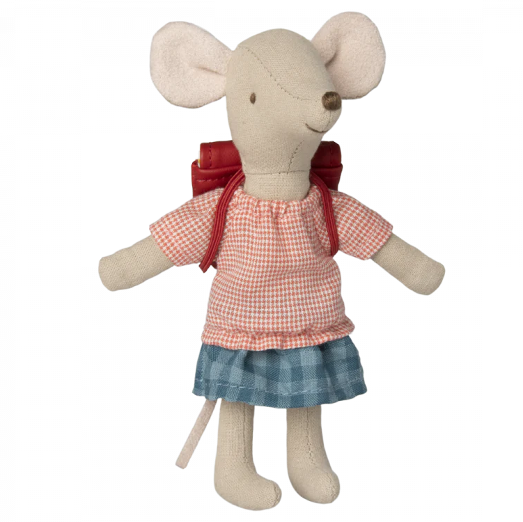 A plush toy resembling a mouse, with a red backpack and a checkered red and white dress, standing upright.