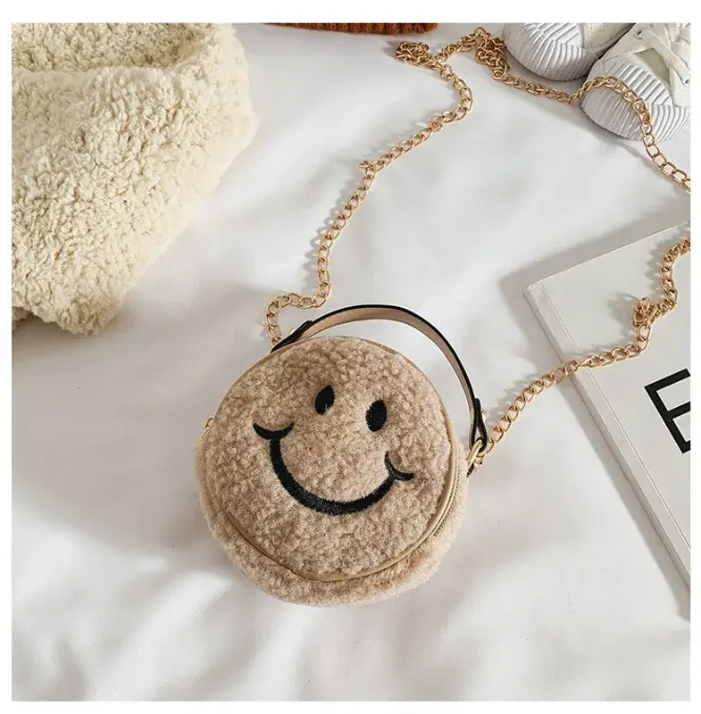 Smiley face cross body bag on sale