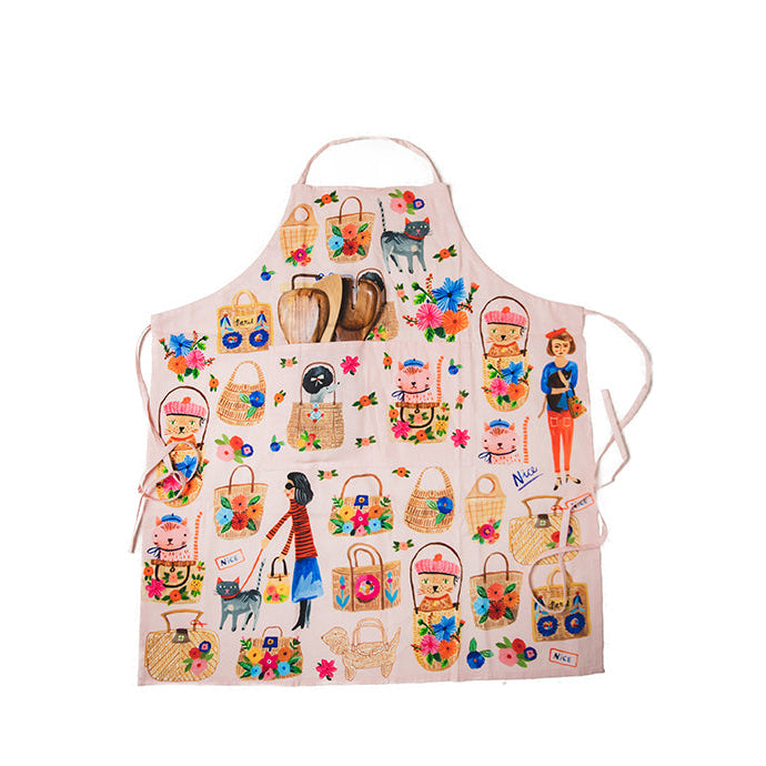 A multicolored cotton apron featuring various illustrated characters and cats, designed by Carolyn Gavin for Bon|Artis.
