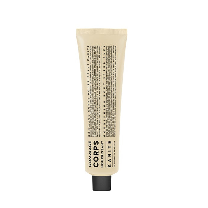 A tube of nourishing shea body scrub with product information printed on it.