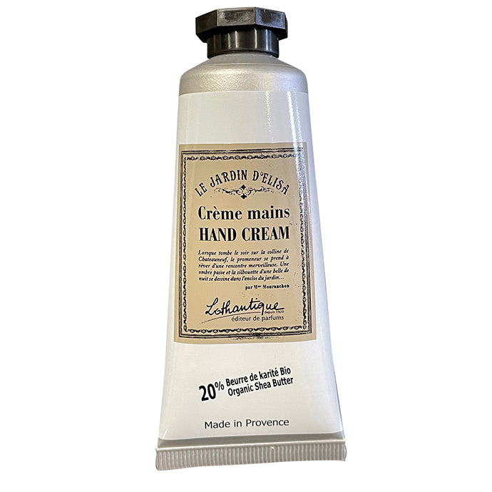 A tube of Le Jardin d'Elisa hand cream with a label showing the product name and Shea butter content, indicating it is made in France.