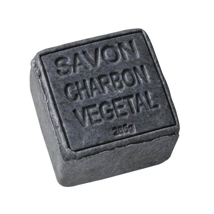 Bar of Savon Charbon Vegetal soap on a white background