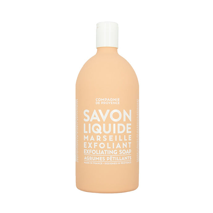 A plastic refill bottle of sparkling citrus liquid exfoliating soap, labeled in French as 'SAVON LIQUIDE EXFOLIANT'.