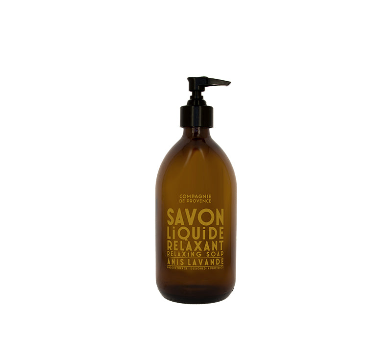A brown glass bottle with a pump dispenser labeled 'Savon Liquide Relaxant' with a relaxing anise lavender scent.