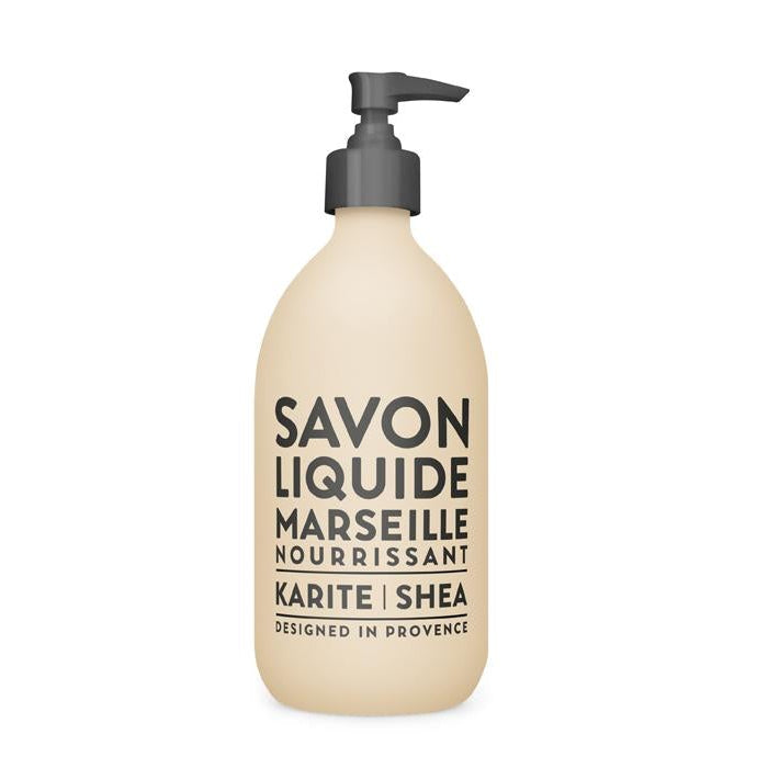 A pump bottle of nourishing shea liquid soap with the label 'SAVON LIQUIDE MARSEILLE NOURRISANT KARITE SHEA' designed in provence.