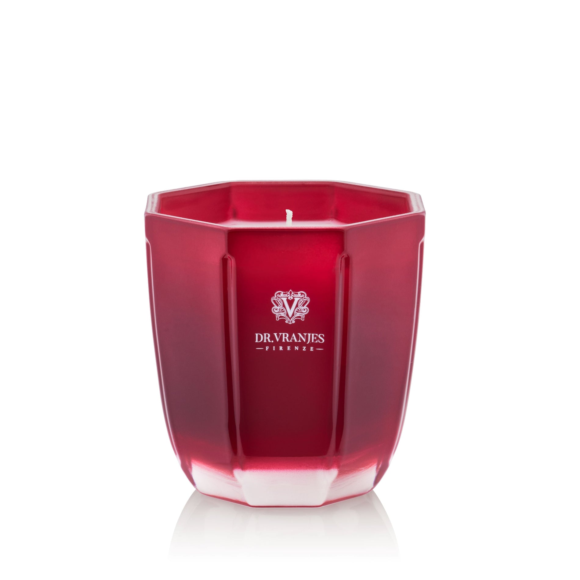 A red, hexagonal glass scented candle with the brand 'DR. VRANJES' visible on the front.