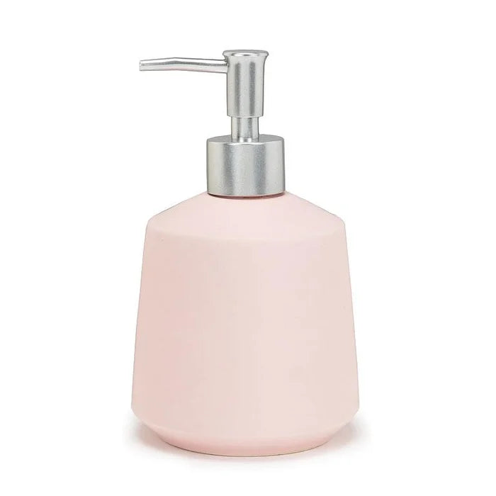 A matte pink soap dispenser with a silver pump.